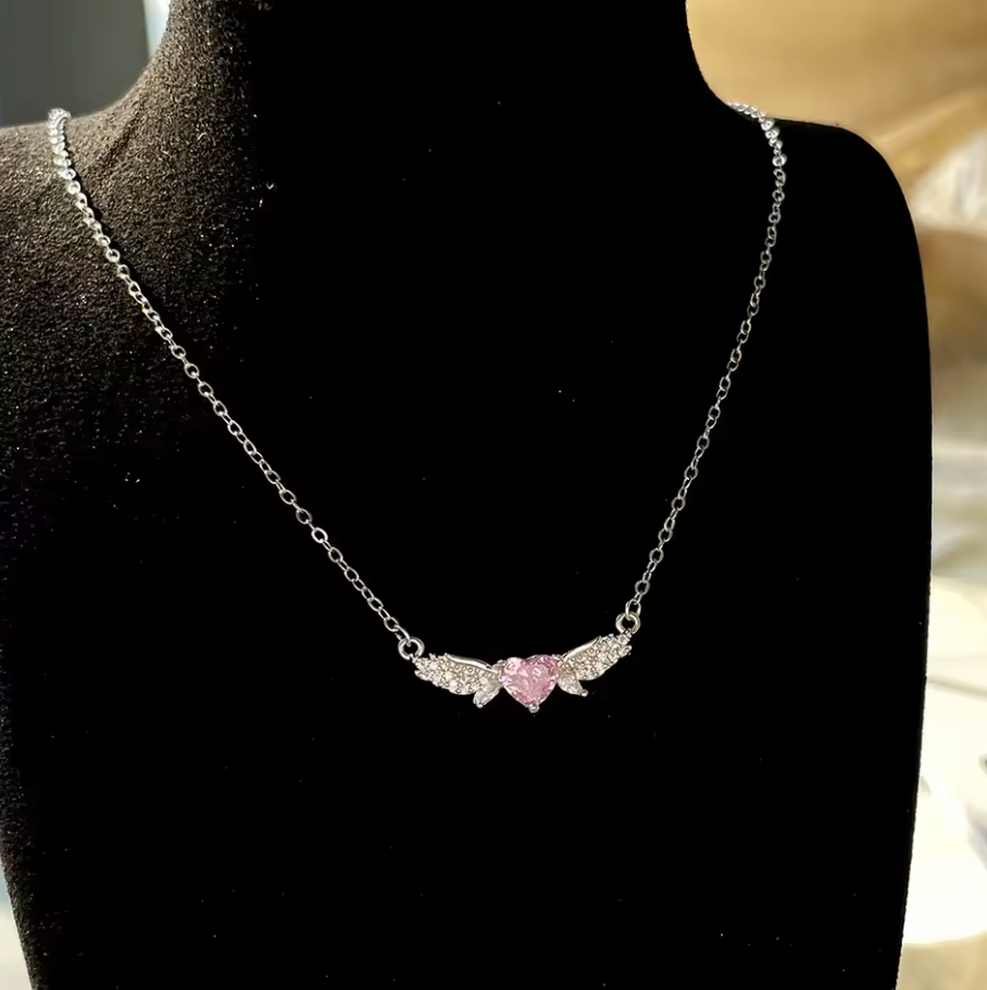 Pink crystal-style heart with silver-tone wing necklace photo 2
