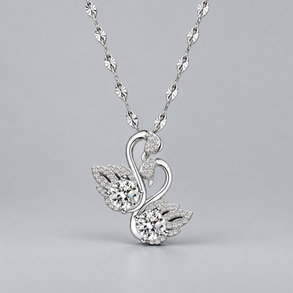 Odette Twin Swan Necklace — front view on soft gray