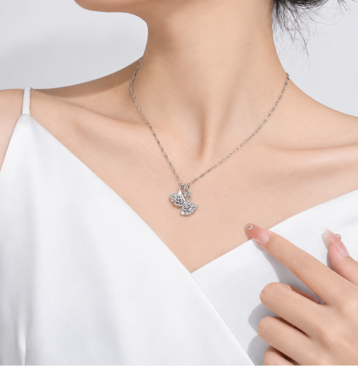 Odette Twin Swan Necklace — alternate worn styling view