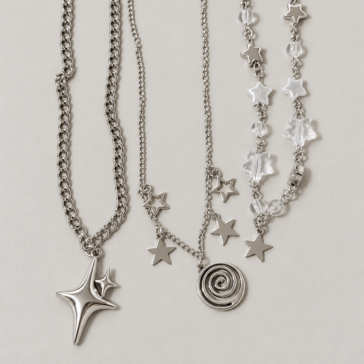 Star Charm Necklace — star, spiral and clear accent details