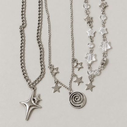 Star Charm Necklace — star, spiral and clear accent details