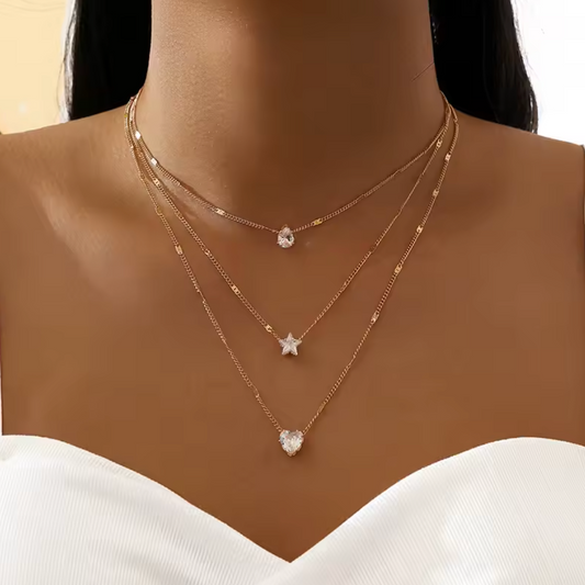 Clara Arden Trinity Three-Charm Layered Necklace in gold-tone
