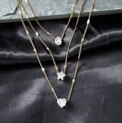 Trinity Three-Charm Layered Necklace worn styling view